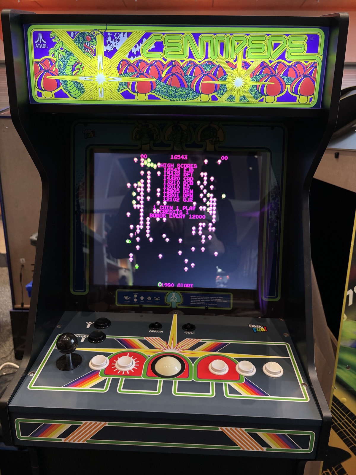Full-size Atari Centipede arcade cabinet with joystick and trackball controls