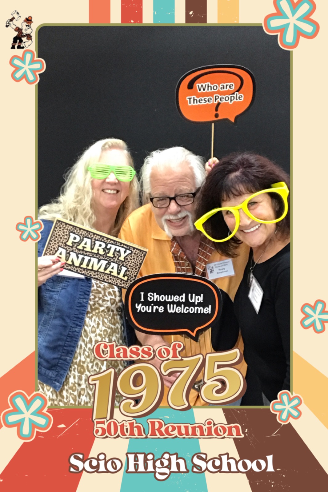 Photo booth print of three guests with props at the Scio High School Class of 1975 50th reunion