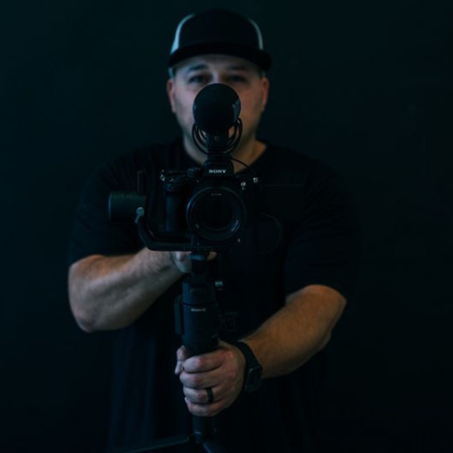 Aaron Cazarez aiming a Sony cinema camera on a gimbal at the viewer